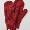 A pair of Cranberry Melange Holly Mittens by Woolx, known for their lightweight warmth, are placed side by side on a light gray background. One mitten features a small white tag with a simple illustration.