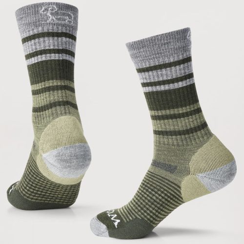 Two odor-resistant Everyday Light Cushion Crew Socks from Woolx in the Moss Stripe color are displayed. These durable socks, with reinforced heels and toes, feature various shades of green and gray stripes crafted from merino wool. One sock is shown from the front and the other from the back, highlighting their horizontal striped design and textured foot pattern.